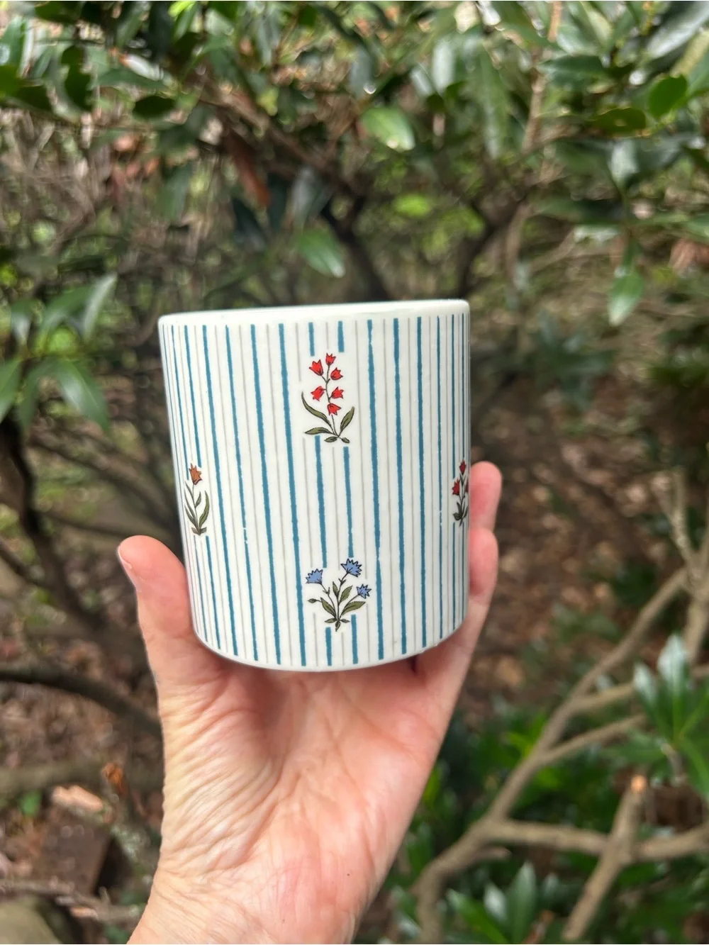Anthropologie White Ceramic Candle with Blue Stripes and Red Floral Accents